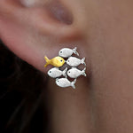 Tegen de stroom in oorbellen