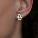 Tegen de stroom in oorbellen